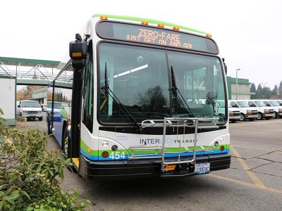 Intercity Transit bus from the front with Zero-Fare message on the reader board